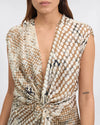 silk dress with polka dot print, sleeveless and low v neck and asymmetrical hemline  close up