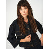 dark blue boxy denim jacket with 2 large buttoned pockets  model shot