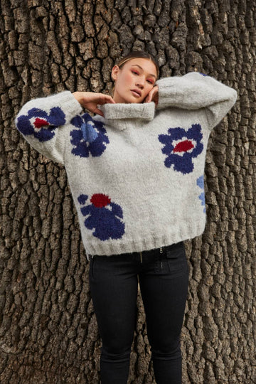 Hand knitted jumper from Baby Alpaca in grey with blue flowers