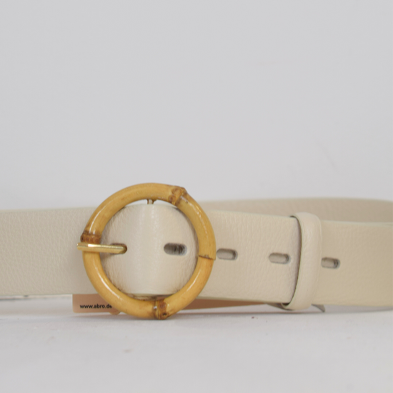 Cream belt with circular buckle