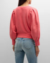 Coral sweatshirt with long volumous sleeves and pleated arms at the shoulders with ribbed cuffs and hem and crew neck