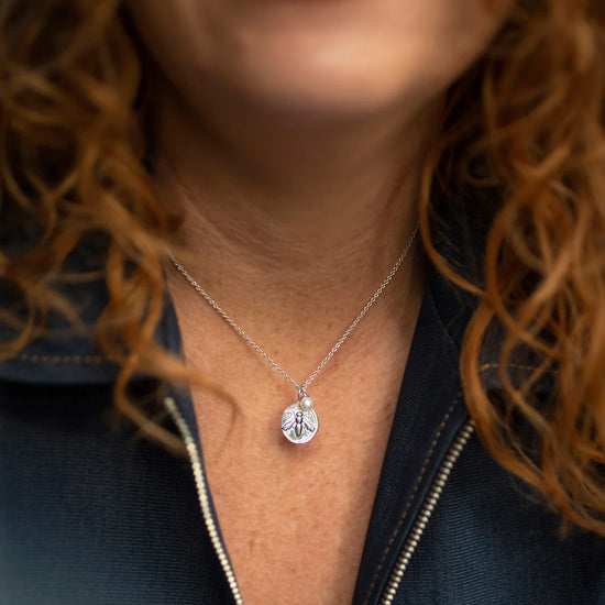 Silver bee coin pendant necklace with small rice pearl on silver chain