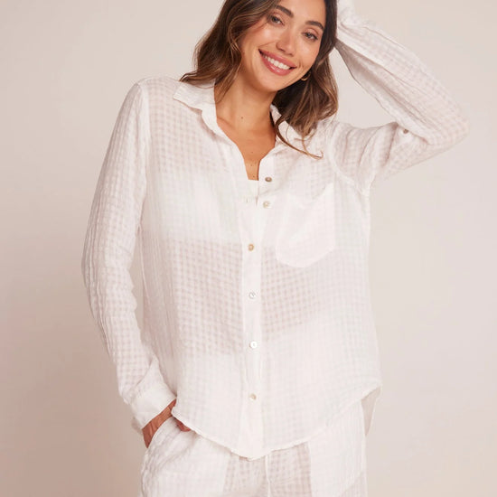 Semi sheer white shirt with single chest pocket small collar and long sleeves