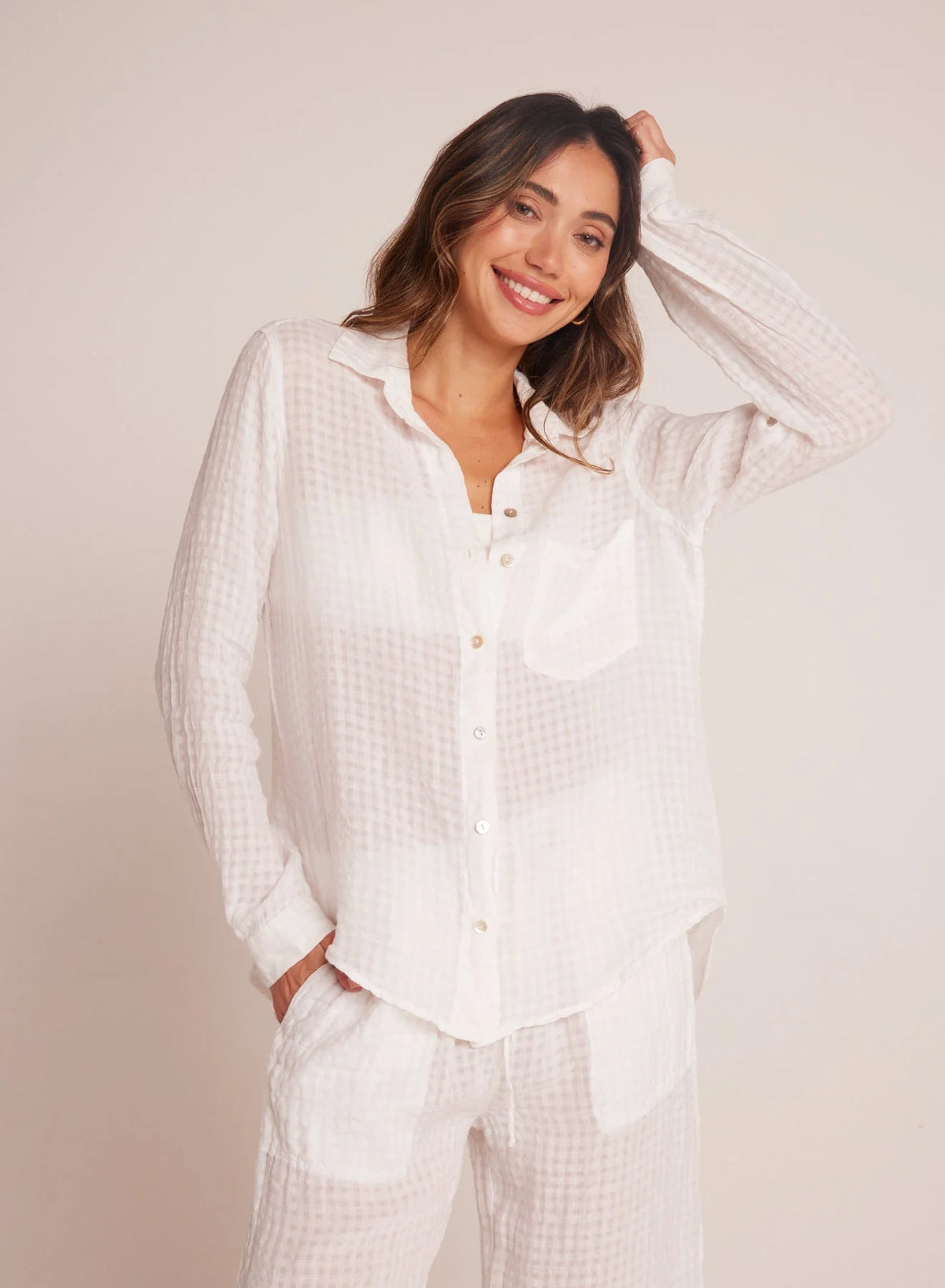 Semi sheer white shirt with single chest pocket small collar and long sleeves