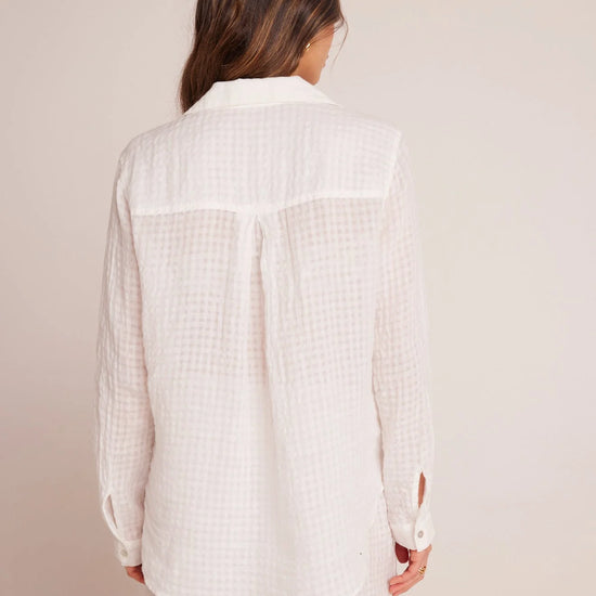 Rear view of white linen and cotton blend shirt with long sleeves and single chest pocket