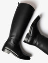 A pair of black leather knee-high riding boots, one shown from a side profile and the other from a rear three-quarter angle, on a clean white background.