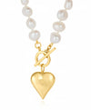 Pearl necklace with a gold heart-shaped pendant on a white background