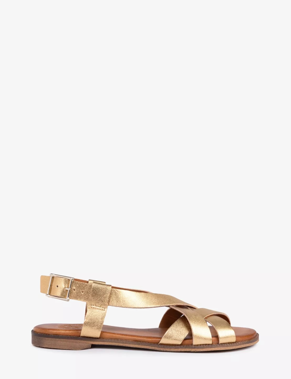Gold sandal on a white background