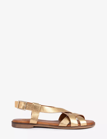 Gold sandal on a white background