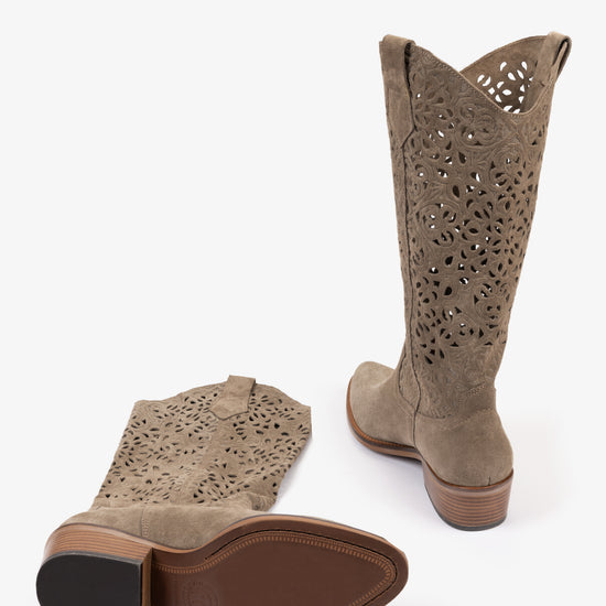Pair of brown suede cowboy boots with cut-out design on a white background from Penelope Chilvers