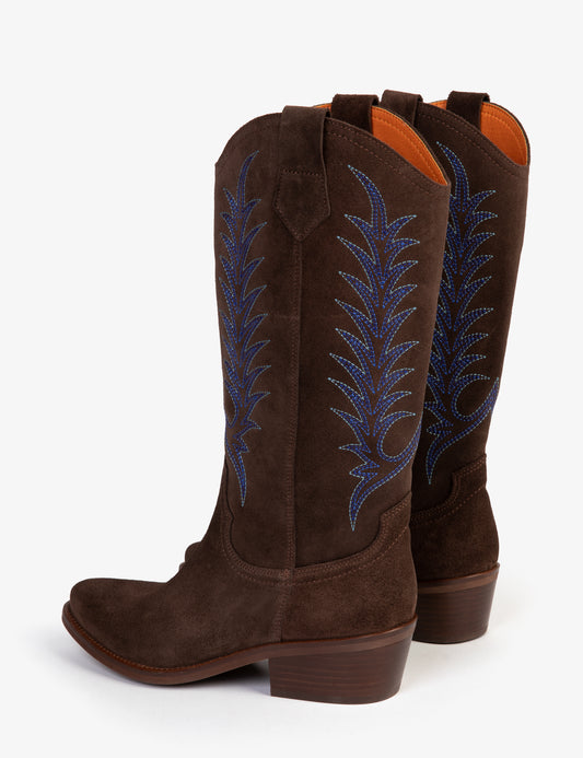 Two Brown cowboy boots with blue embroidery on white background