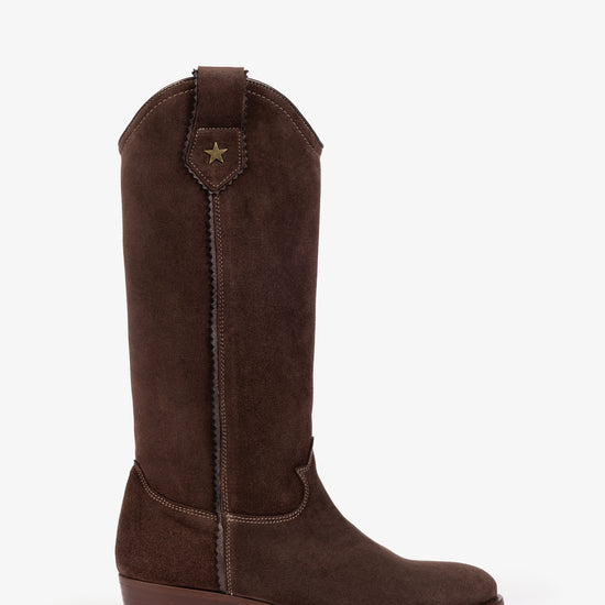 side view of chocolate brown suede cowboy boot with small star detail at the top and a small heel