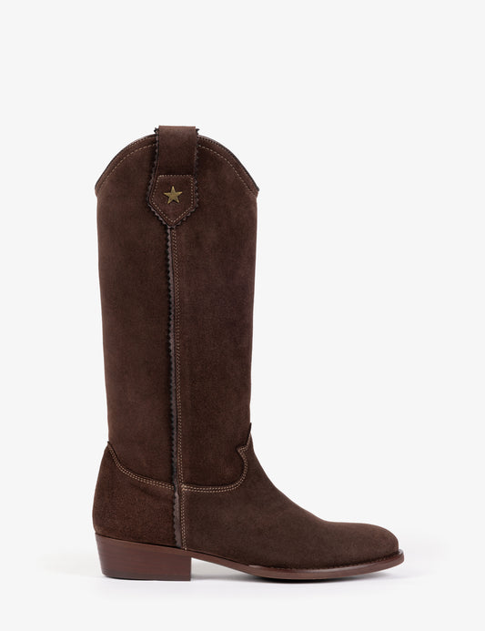 side view of chocolate brown suede cowboy boot with small star detail at the top and a small heel