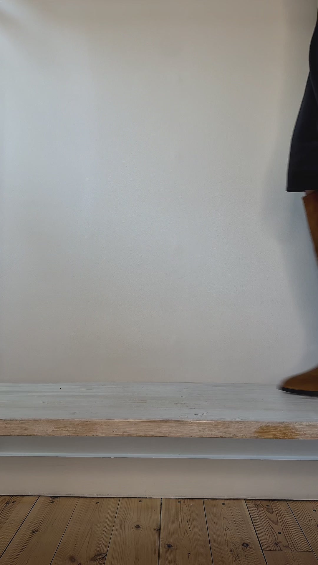 Model wearing tan suede western style boot shown at different angles. 