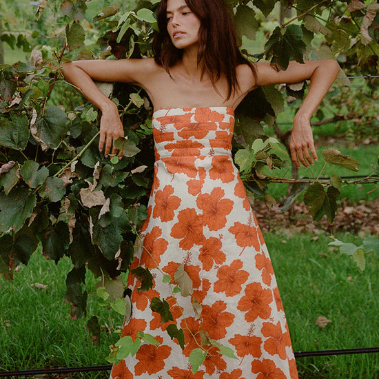 red hibiscus spaghetti strap maxi dress  model shot