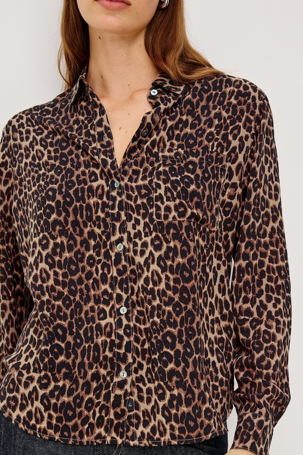 Brown animal print classic shirt with chest pocket close up