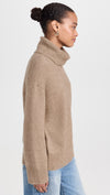 oatmeal roll neck with ribbed neck, cuffs and hem and dropped shoulders side view 