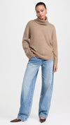 oatmeal roll neck with ribbed neck, cuffs and hem and dropped shoulders model shot