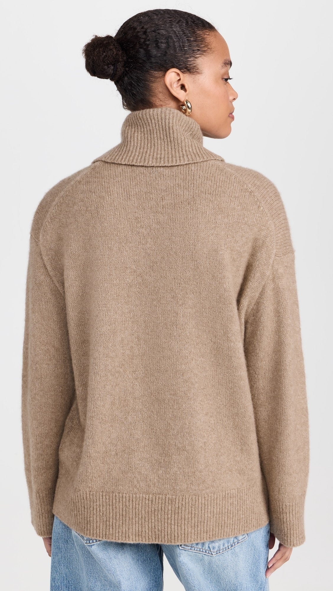 oatmeal roll neck with ribbed neck, cuffs and hem and dropped shoulders rear view