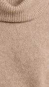 oatmeal roll neck with ribbed neck, cuffs and hem and dropped shoulders close up