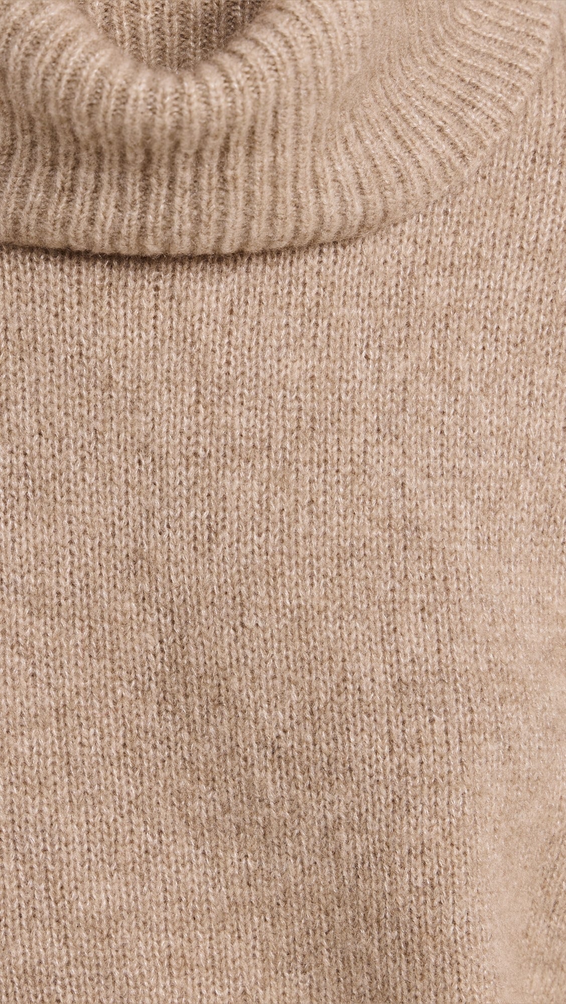 oatmeal roll neck with ribbed neck, cuffs and hem and dropped shoulders close up