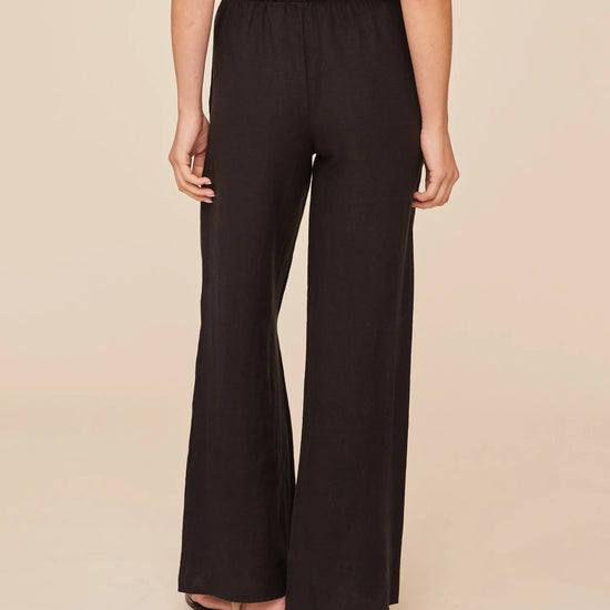 Rear view of black wide leg trousers