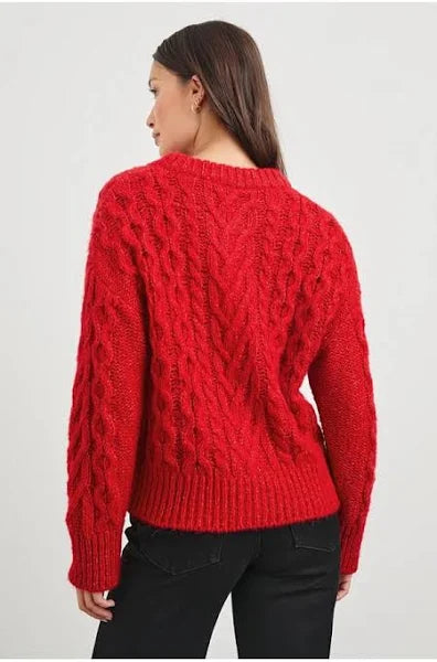 red cable knit cardigan with round neck and long sleeves rear view