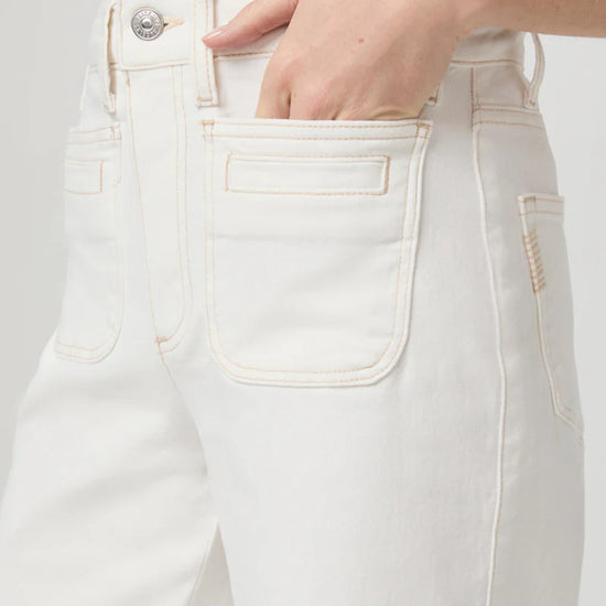 wide leg ecru stitch patch pocket deep hem crop jeans from paige close up of pocket