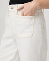 wide leg ecru stitch patch pocket deep hem crop jeans from paige close up of pocket