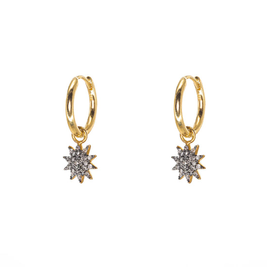 Starburst gold hoop earrings with pave diamonds