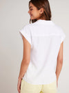 Short sleeved white shirt with grown sleeve and turn up cuffs