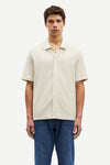 oatmeal short sleeved shirt with point collar in a slubbed textured material model shot