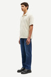 oatmeal short sleeved shirt with point collar in a slubbed textured material side view 