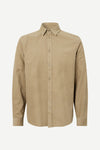 light brown baby cord button down shirt with single button cuff and curved hem 