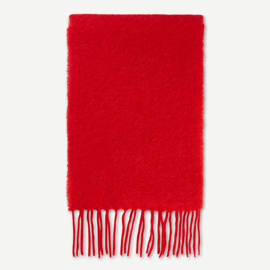 Red scarf with fringed edges
