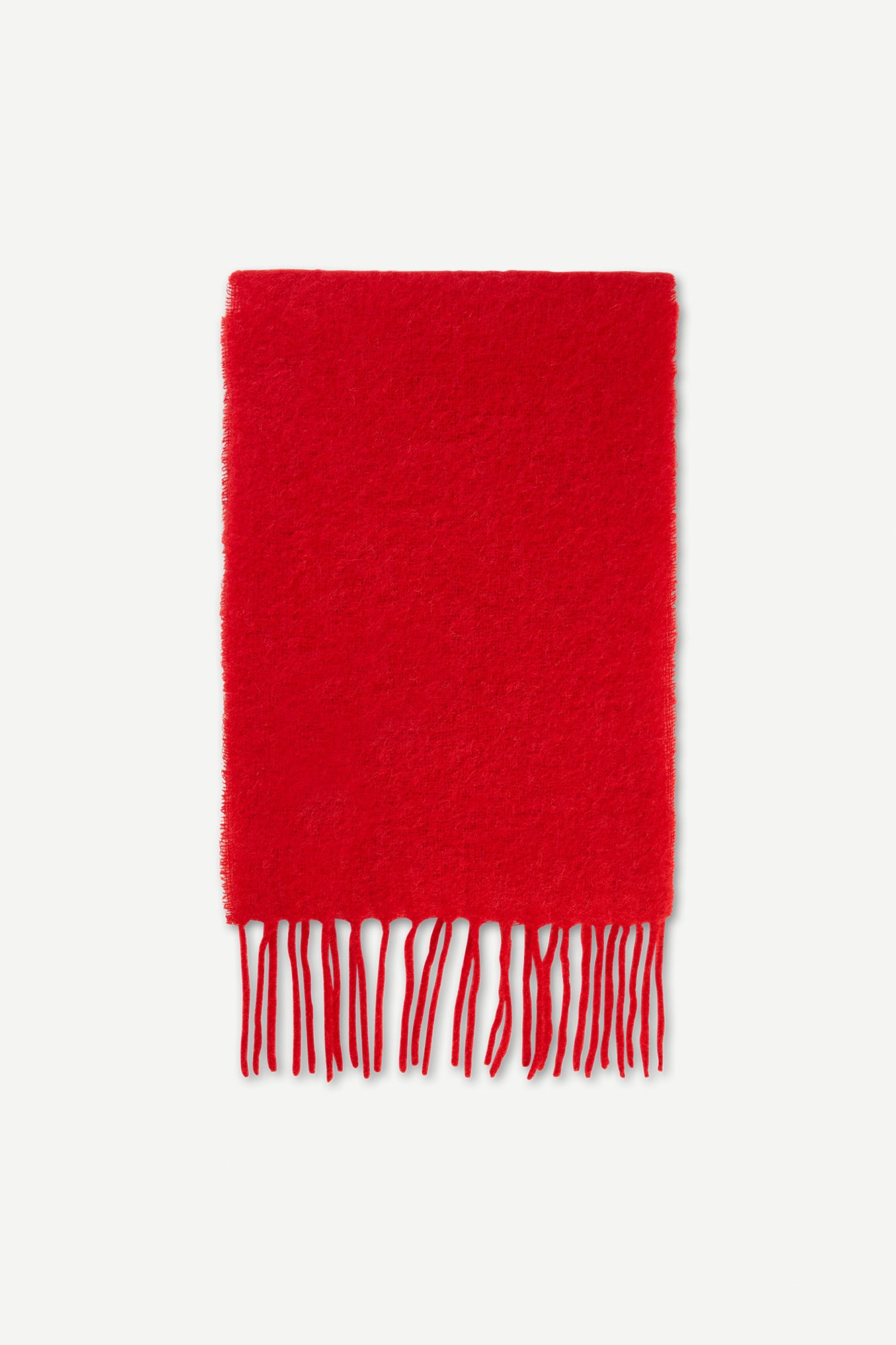 Red scarf with fringed edges
