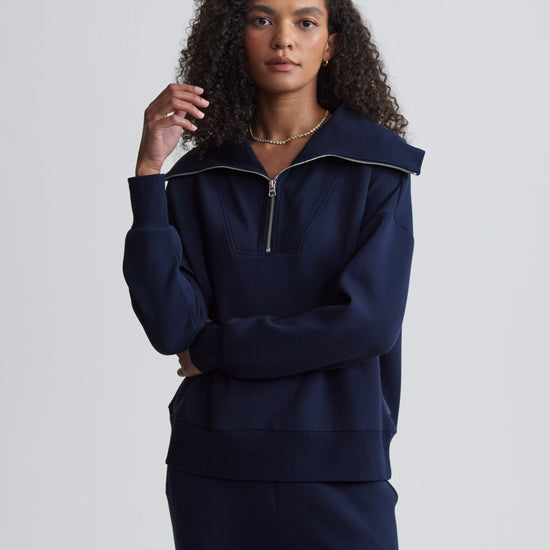 Navy blue double soft sweatshirt with a half zip and long sleeves