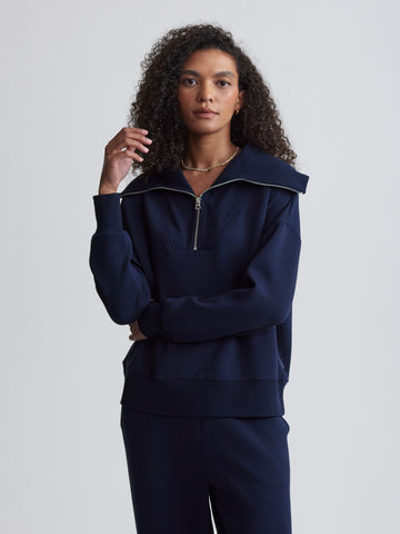 Navy blue double soft sweatshirt with a half zip and long sleeves