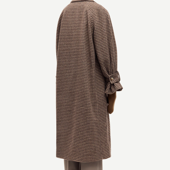 oversized brown check winter coat with wide sleeves with belted cuffs and concealed placket  rear view