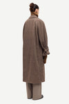 oversized brown check winter coat with wide sleeves with belted cuffs and concealed placket  rear view