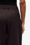 brown tailored trousers with pleated front, concealed fastening and straight fit rear view close up