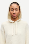 cream hoodie with drawstring neck and rub detailing close up