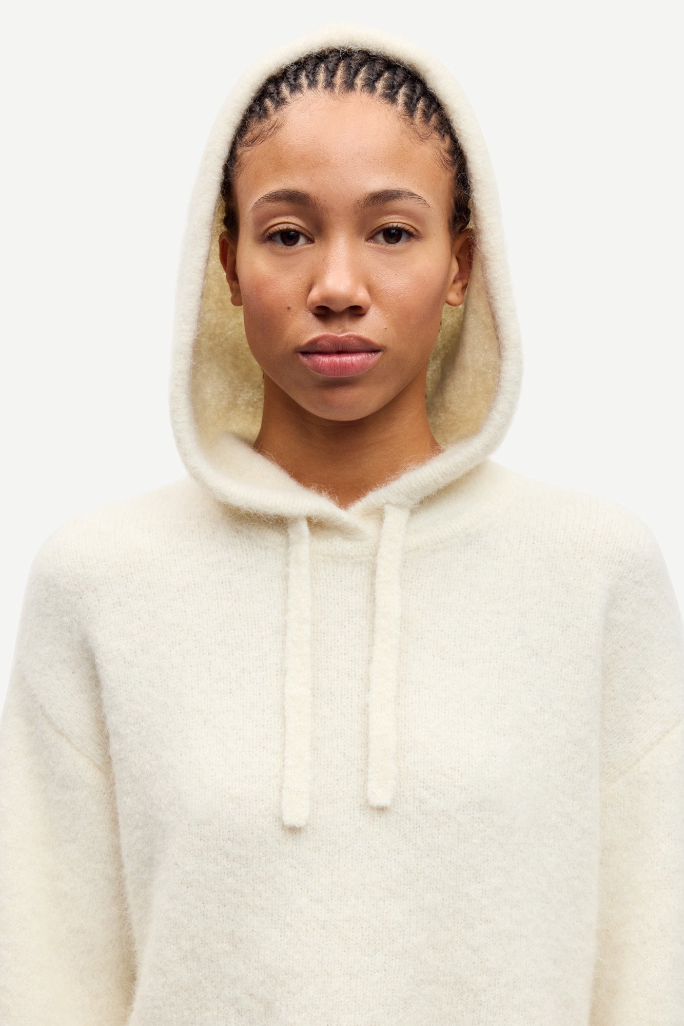 cream hoodie with drawstring neck and rub detailing close up