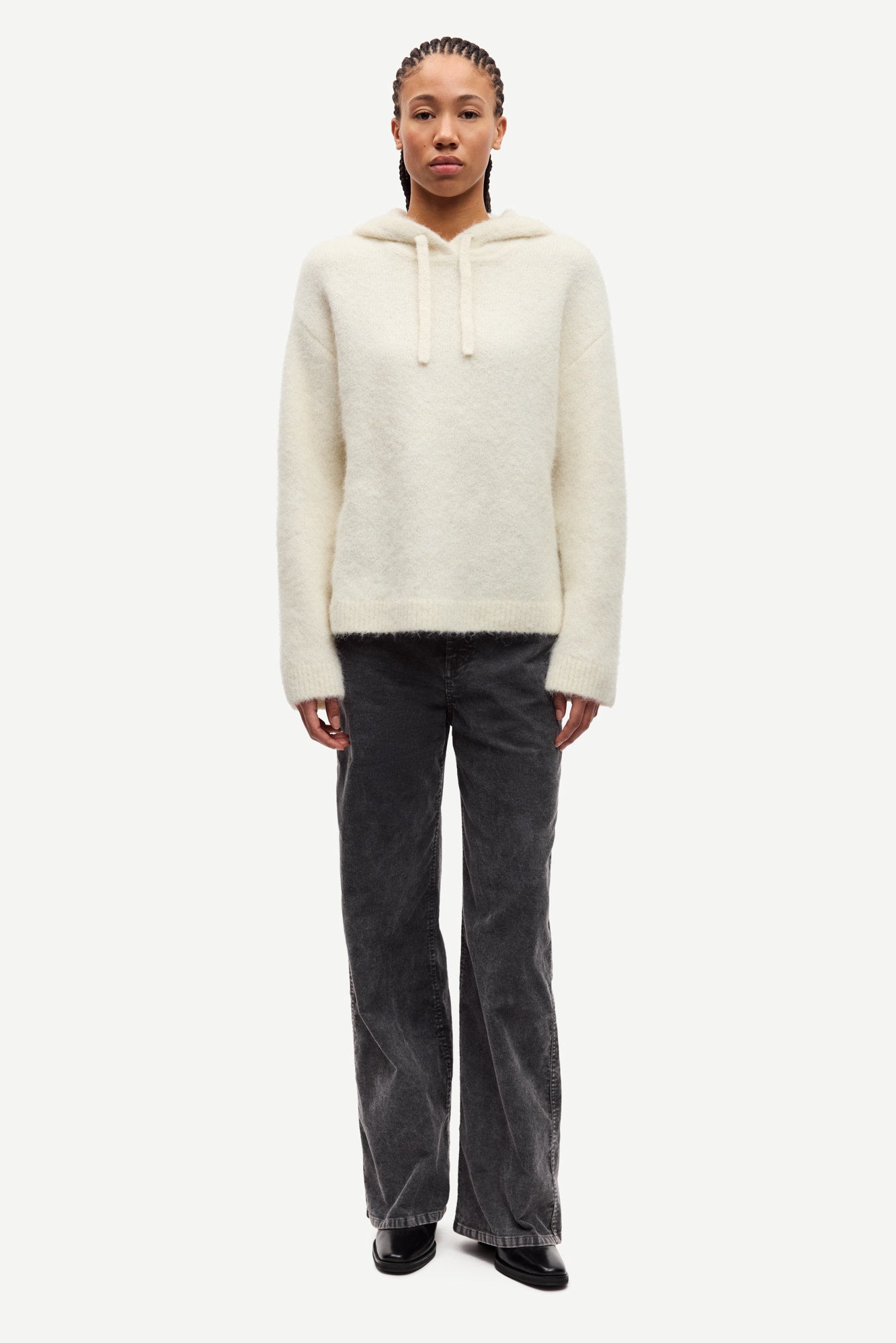 cream hoodie with drawstring neck and rub detailing model shot