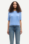 round neck short sleeve light blue jumper with rib detailing and cropped fit model shot