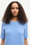 round neck short sleeve light blue jumper with rib detailing and cropped fit close up