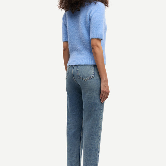 round neck short sleeve light blue jumper with rib detailing and cropped fit rear view 