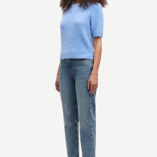 round neck short sleeve light blue jumper with rib detailing and cropped fit side view 