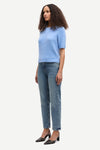 round neck short sleeve light blue jumper with rib detailing and cropped fit side view 