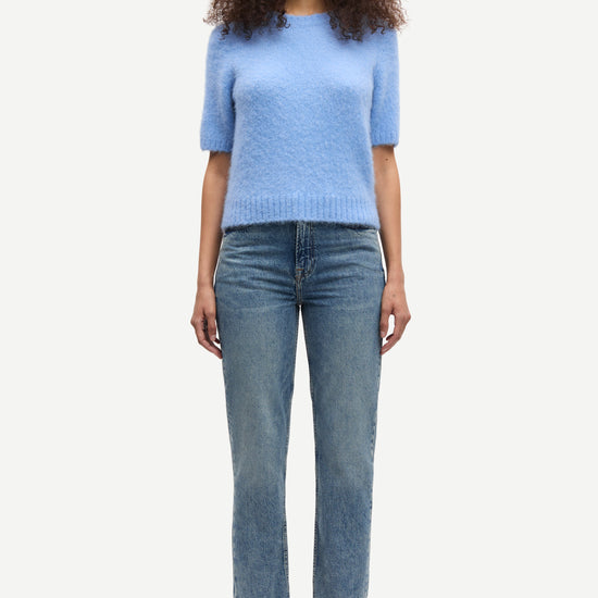 round neck short sleeve light blue jumper with rib detailing and cropped fit model shot